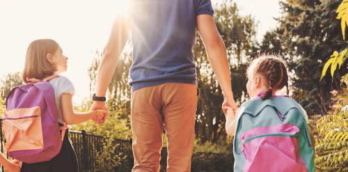 This image: An illustrative photo of a father walking his two young daughters to school on a sunny day.
						 The map: The map now shows an artist's watercolour sketch of how the site could look, with interactive
						 map labels over key aspects of the proposals.